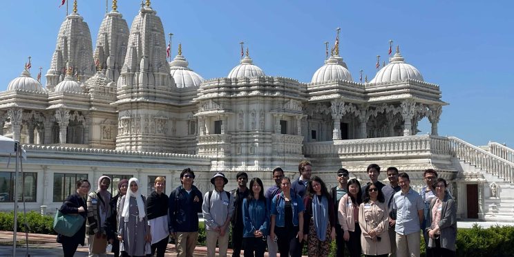 Participants of Interfaith bus tour in front of Hindu temple