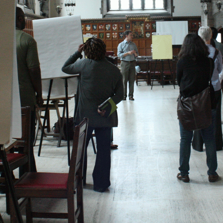 Staff at a workshop in Hart House Great Hall.