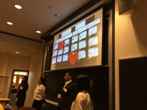 Four people giving a power point presentation