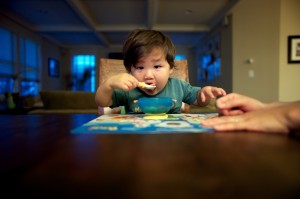 Baby Eating Cereal By BobbyBokeh