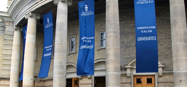 Convocation Hall with banners that say congratulations