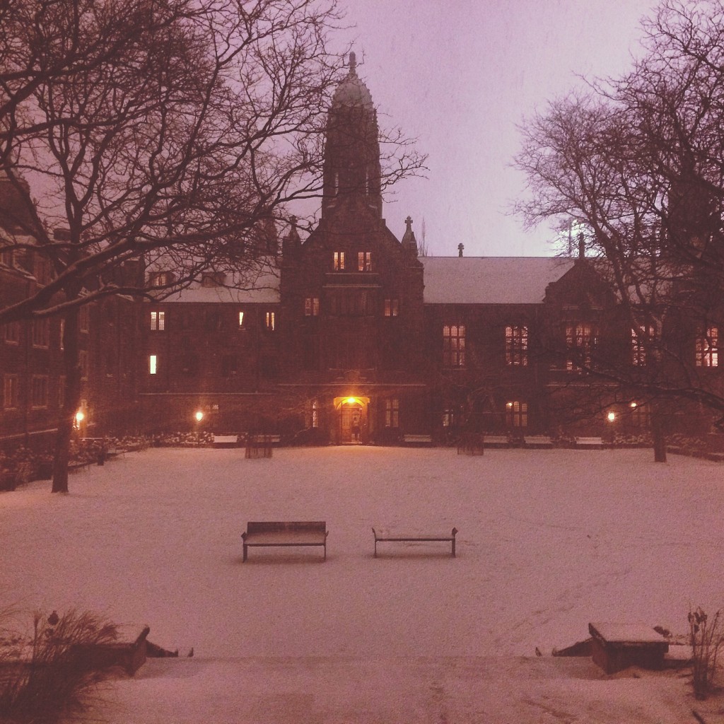 A picture of the Trinity College quad covered in snow, with a nice reddish filter for added effect.