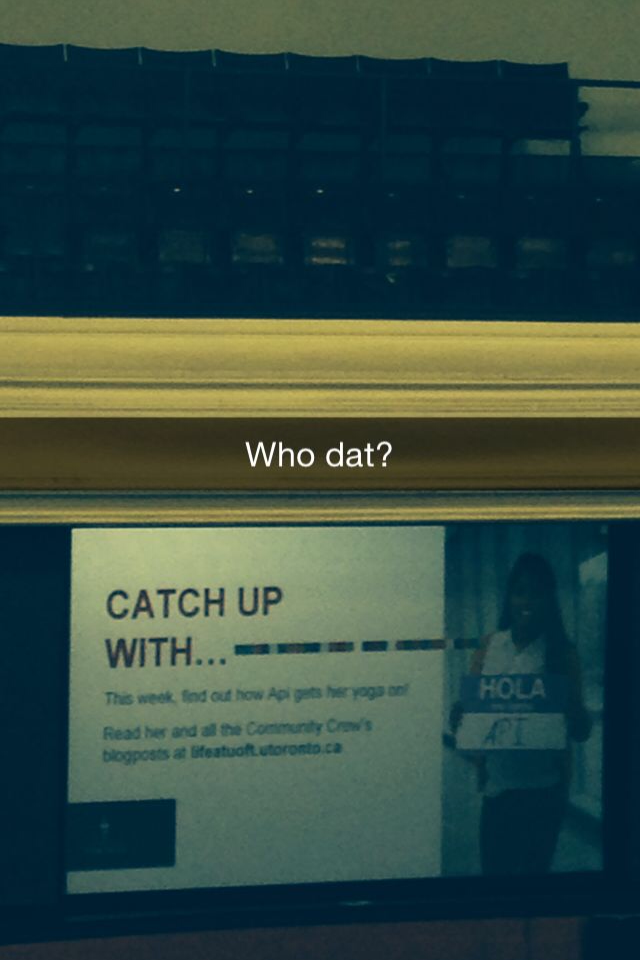 Screen shot of Api on giant screen at Convocation Hall with text cap on the photo reading "who dat"