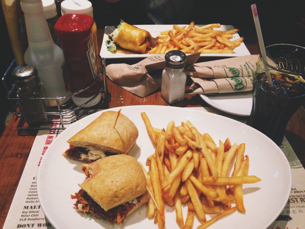 a picture of my delicious food - a pulled pork sandwich and fries
