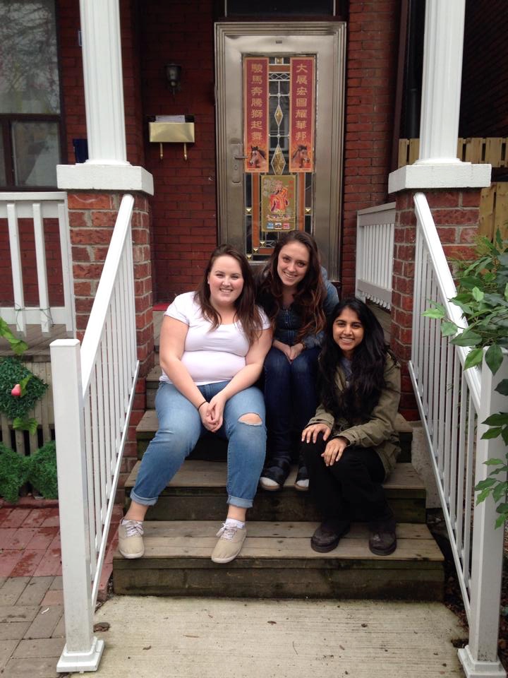 A photo of me and 2 of my roommates after we had officially signed our lease and moved in! (in MAY) 