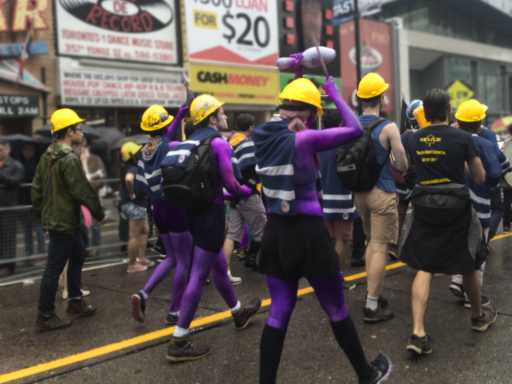 purple U of T engineers marching in the 2015 pride parade