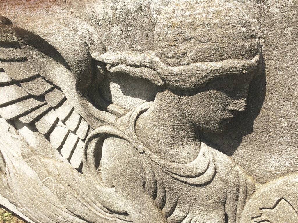 photo of a creepy angel sculpture 