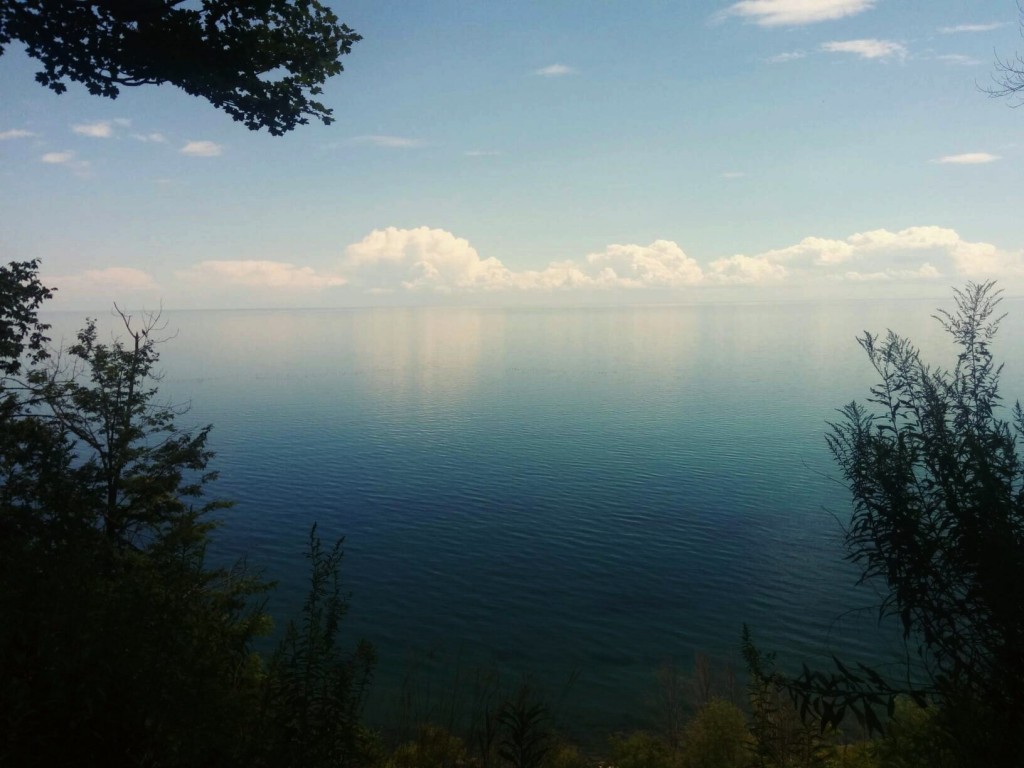 photo of clouds reflecting on lake ontario