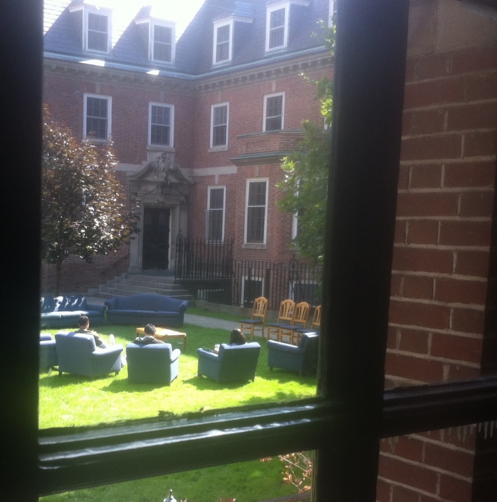 photo of a residence court yard with chairs in it 