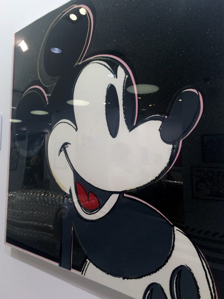 an image of mickey mouse from Warhol's "Myths" collection, accented with diamond dust