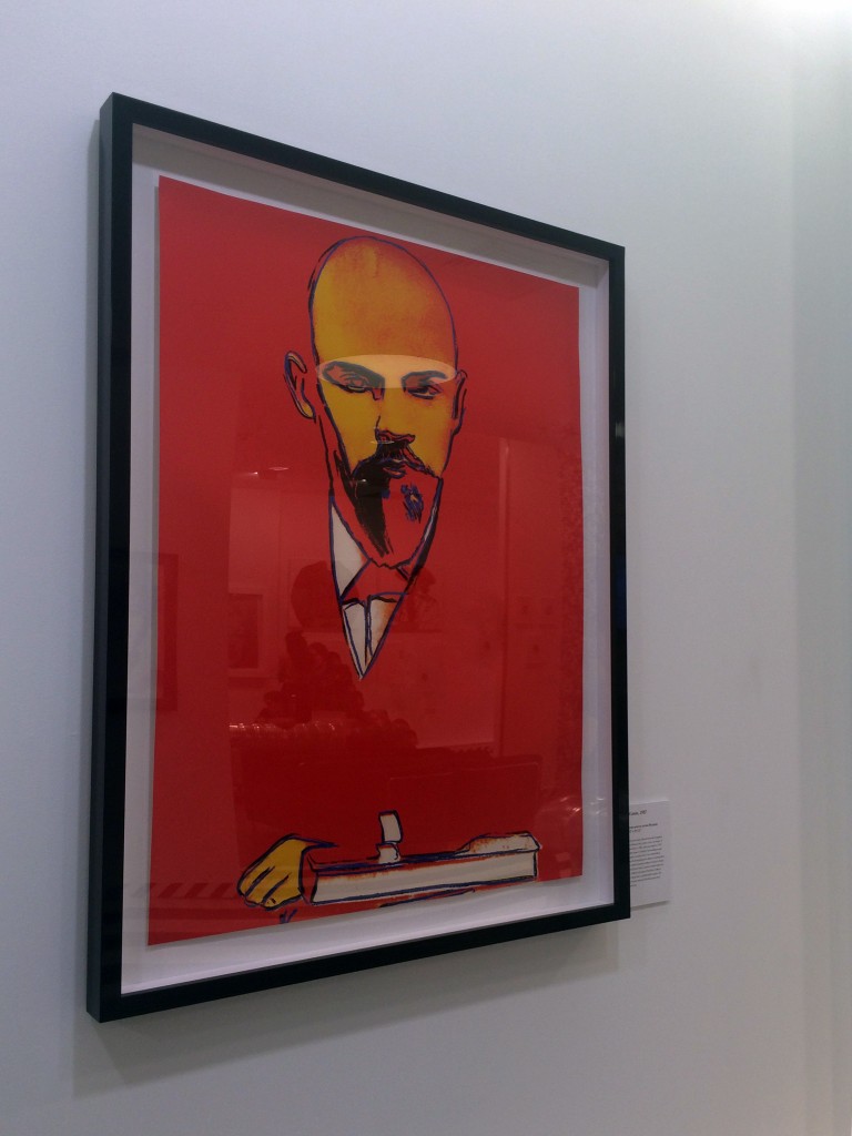 a portrait of Lenin, predominately coloured red 