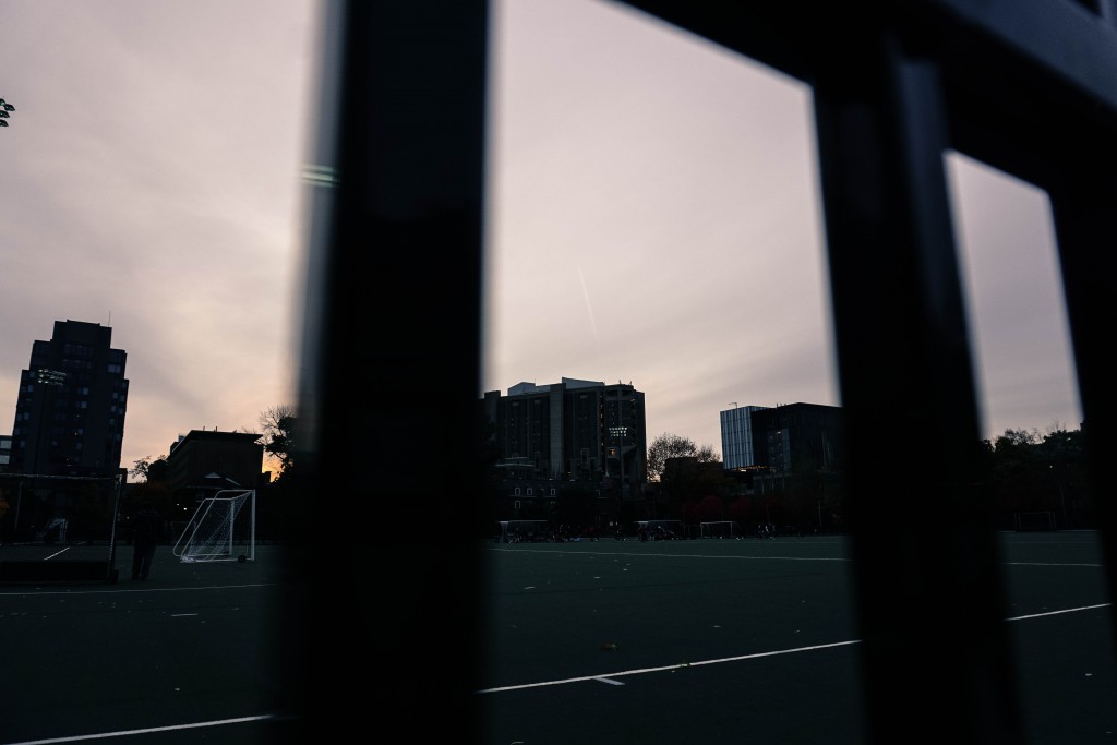 photo of the sunset behind robarts taken from back campus 