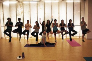 Some members of the UC Yoga Club with primary instructor David London in front. 