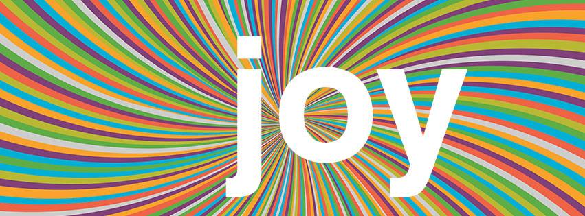 An image that says "joy" with a colour swirl behind it.
