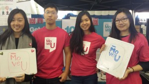 MoveU Crew volunteers Michelle, Aaron, Alcina, and Andrea at the Summer Job fair booth on Tuesday!