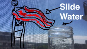 A photo of a jar of water over looking the don valley with a red slide drawn beside it and a stickfigure climbing up the slide