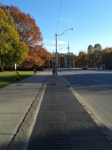 Photo of sidewalk with CN Tower in the background