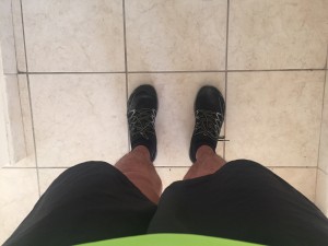 a photo of legs and feet showing that blogger Jasper has in fact laced up his running shoes
