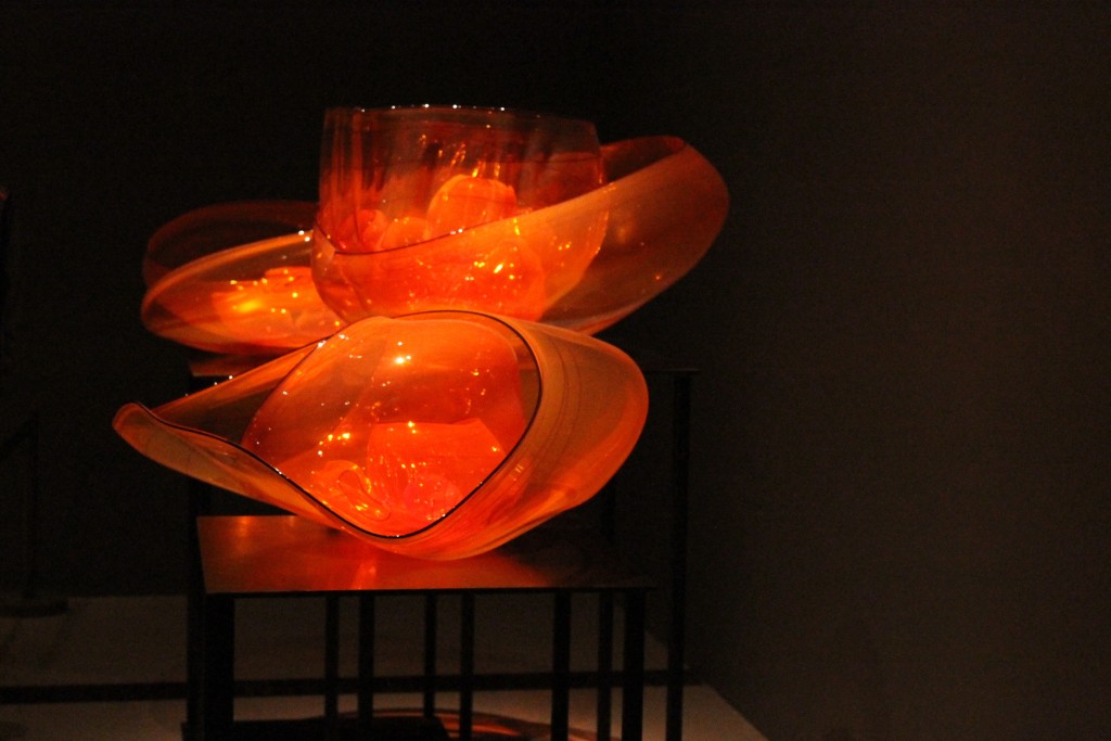 An orange wielded glass art piece