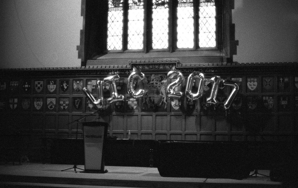 Letter balloons behind a stage reading VIC 2017