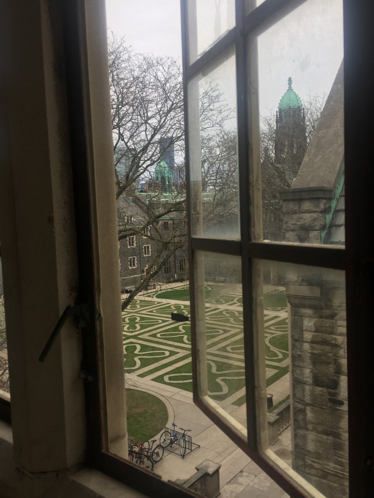 A picture of the Trinity College Quad from a window.