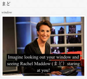 Rachel Maddow sitting at news desk, with the caption "Imagine looking out your window and seeing Rachel Maddow (まど) staring at you!"