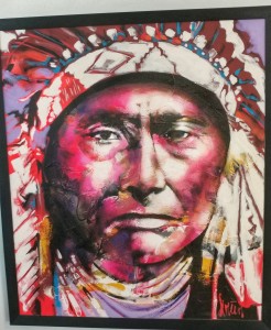 Painting of Indigenous man wearing headdress