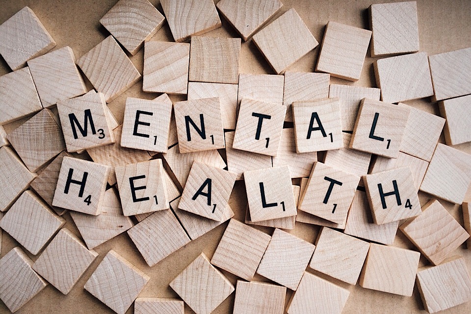 Scrabble letters spelling out "Mental Health"