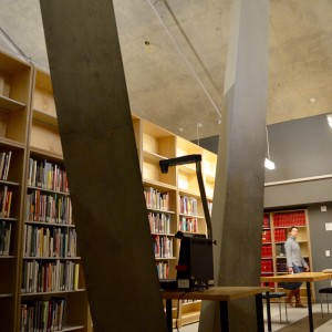 The basement level of Daniels library with two huge concrete pillars 