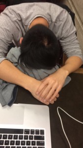 student sleeping in library 