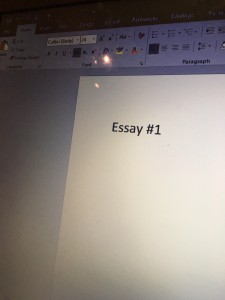 A photo of a screen that says "Essay #1"