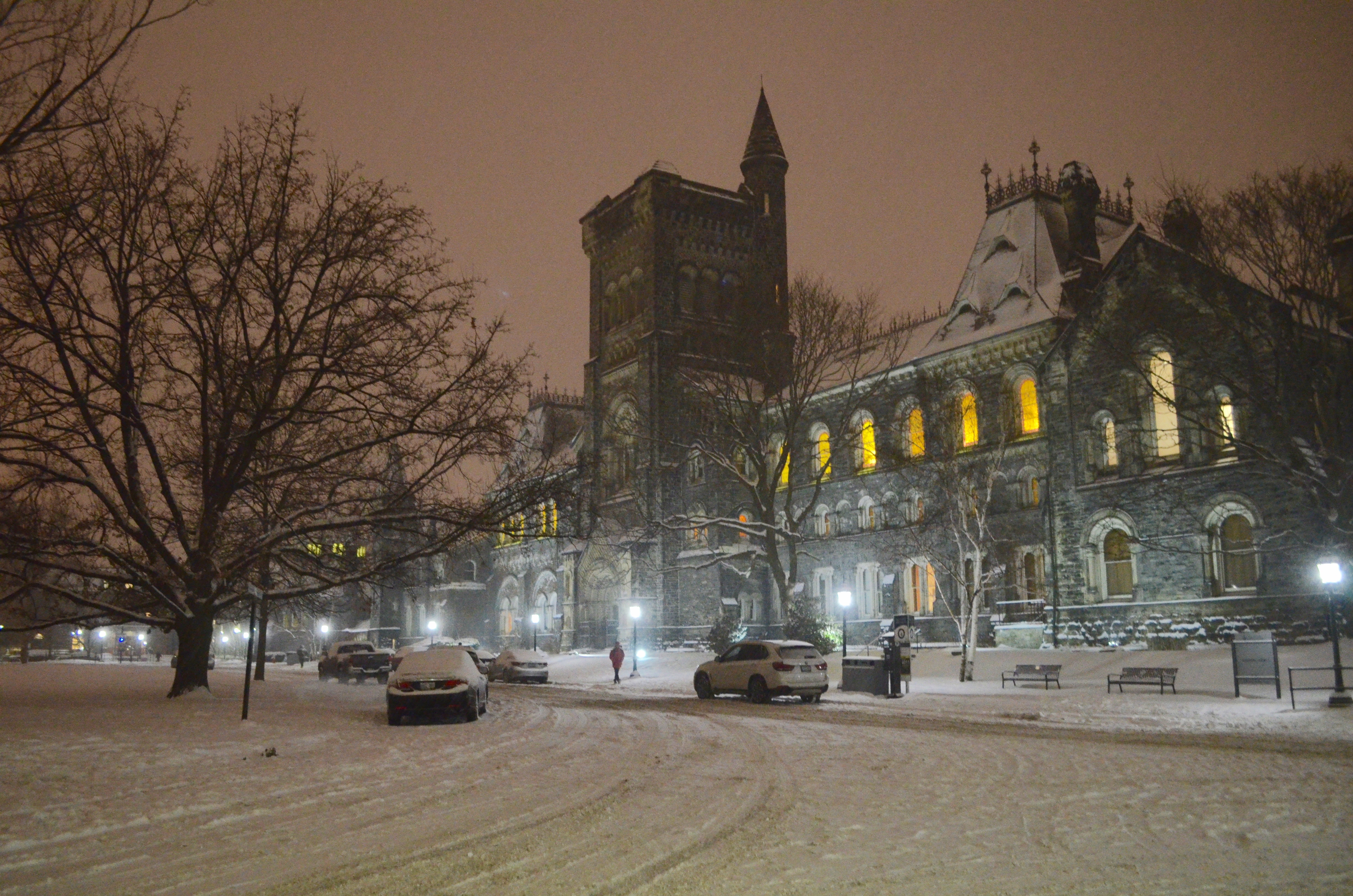 night time shot of University College in winter