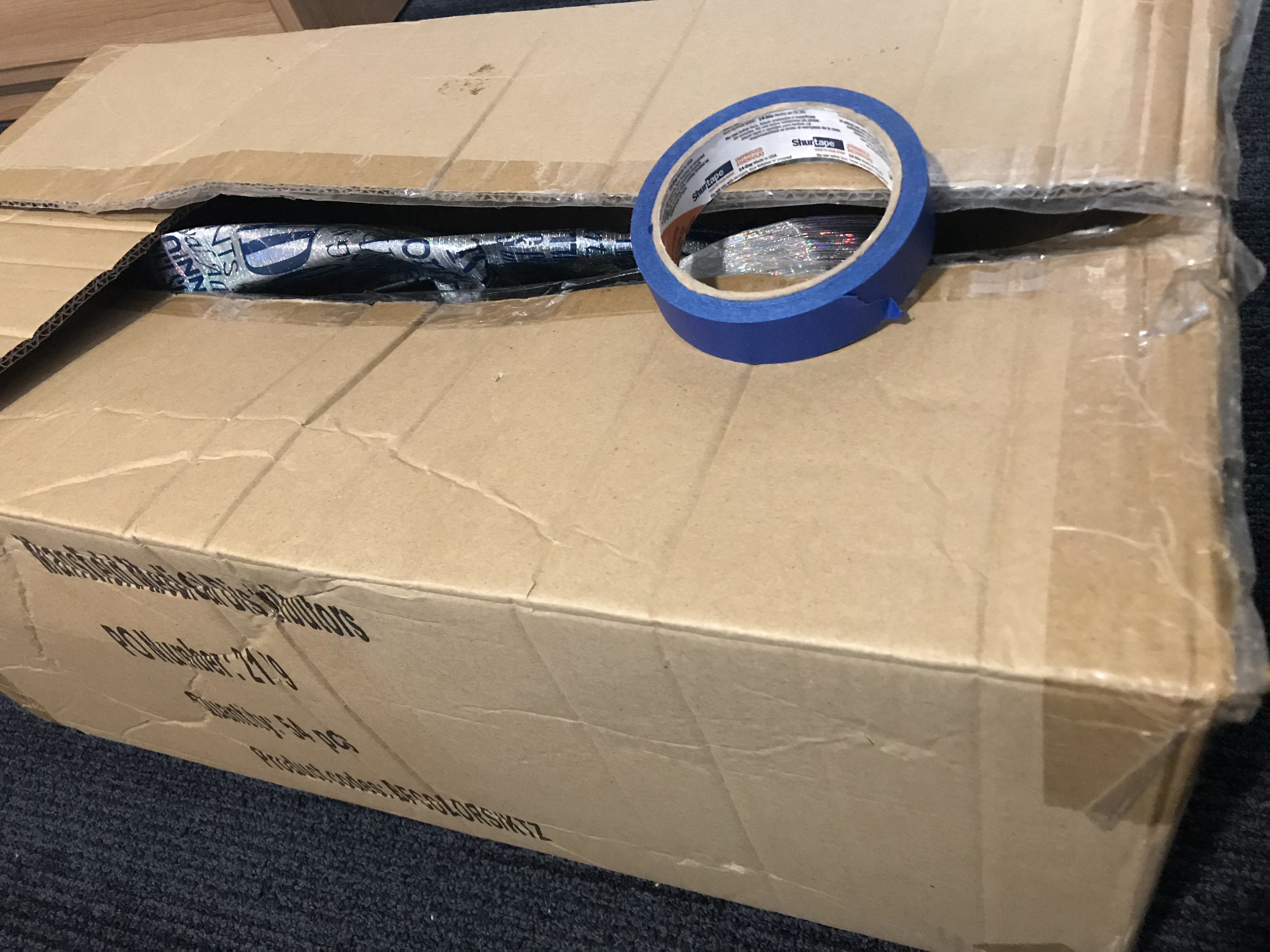 A photo of a box and tape