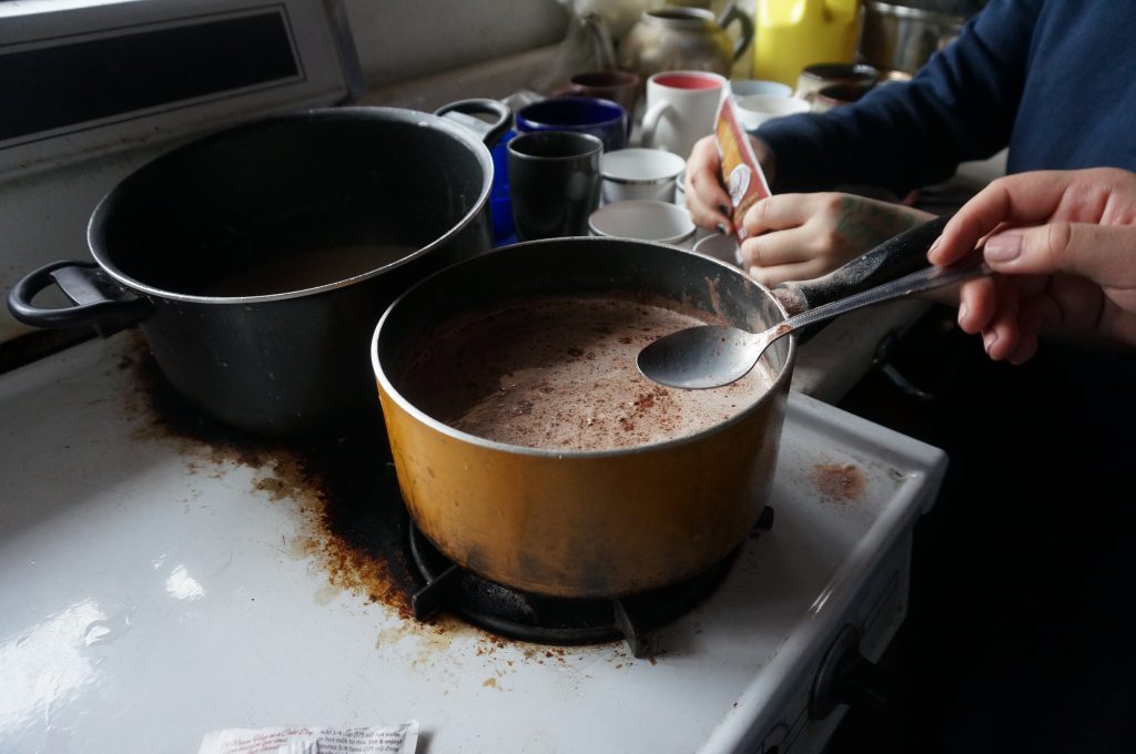hot coco being made in a pot