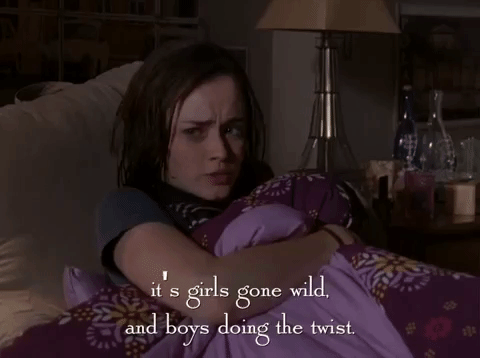 GIF from Gilmore Girls. Rory is in bed. Caption reads "it's girls gone wild, and boys doing the twist. We're not spring-breaky people, are we?"