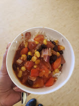 The meal created in this event: A bowl with rice and vegetables.