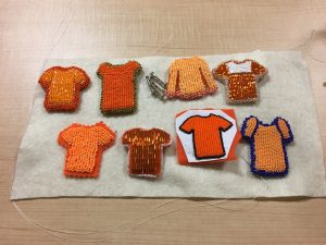 Jenny Blackbird's collection of orange shirt beadings