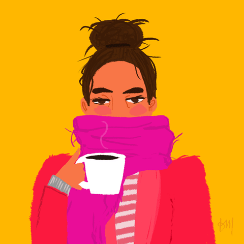 person sipping coffee. they are wearing a scarf
