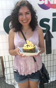 Author holding a pineapple softserve