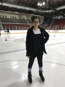 Me standing in my ice skates