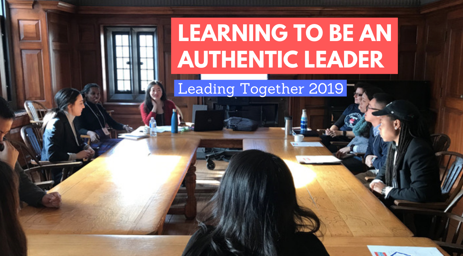 Learning to be an authentic leader:Leading together 2019 blog banner, people sitting around square wooden table