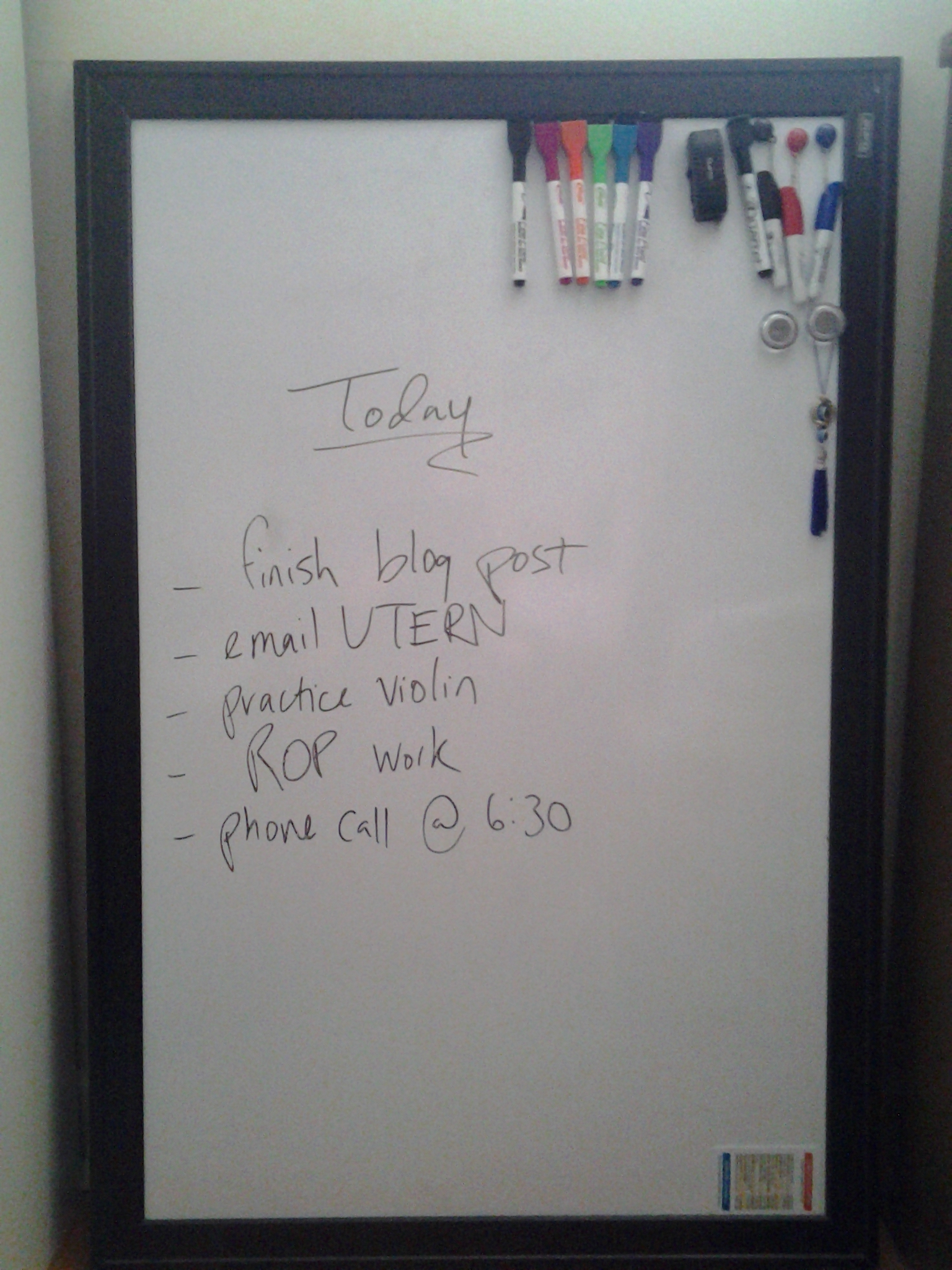 A picture of my whiteboard. Caption: An example of how I use my whiteboard