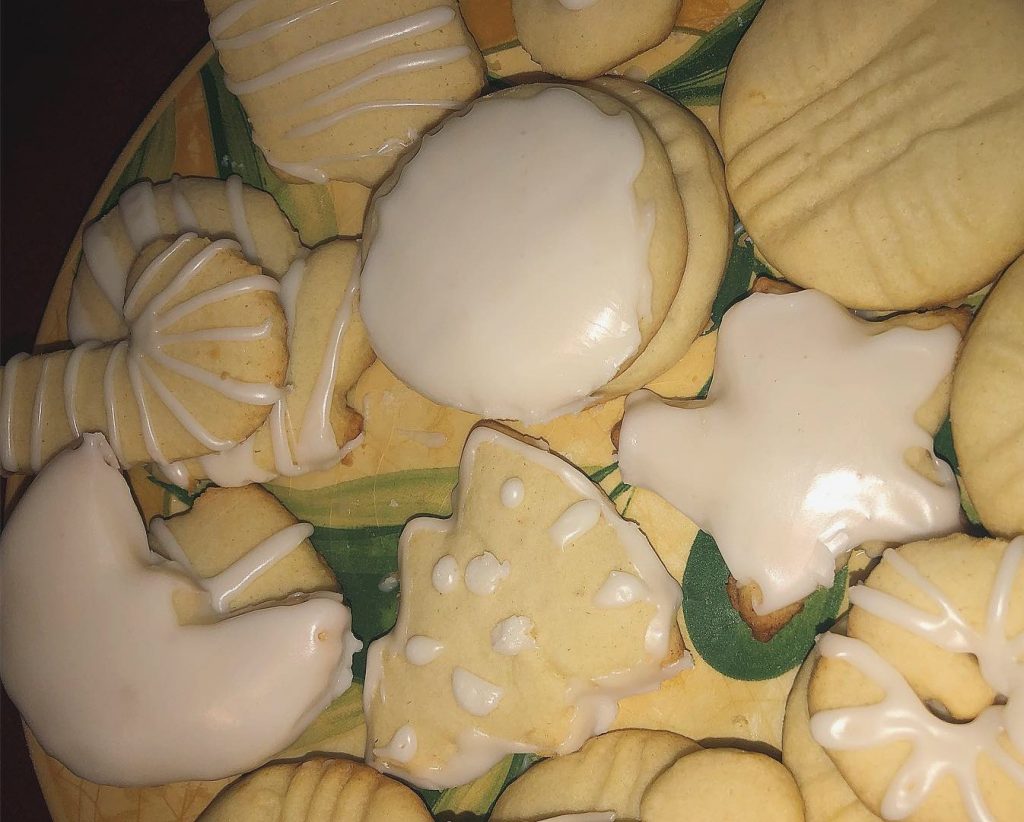 Sugar cookies decorated with a Christmas theme