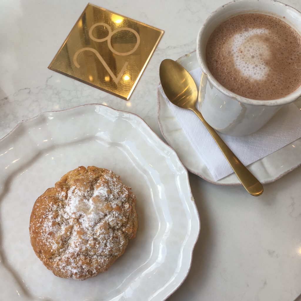 A scone and a hot chocolate from Sorelle and Co.