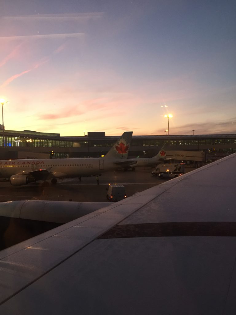 An airport runway at dawn.