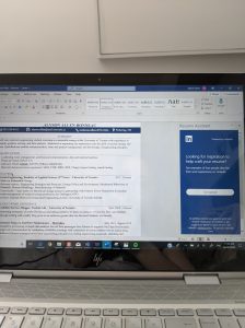 Laptop screen with resume on the left of it and a notification on the right about resumes