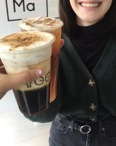 A picture of two people holding bubble tea