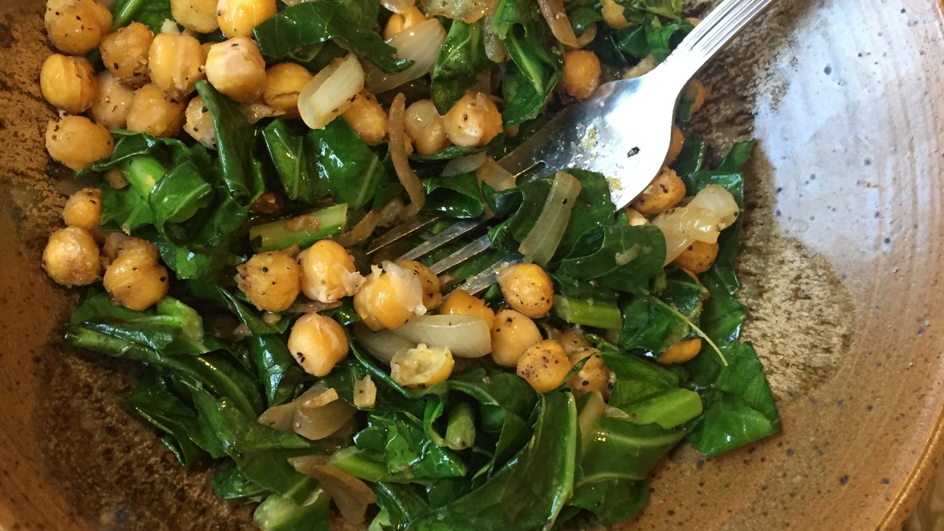A picture of chickpeas and collard greens