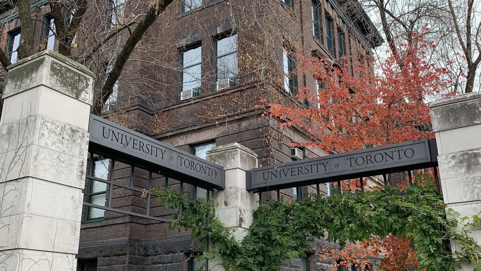 an on-campus monument that reads "University of Toronto"