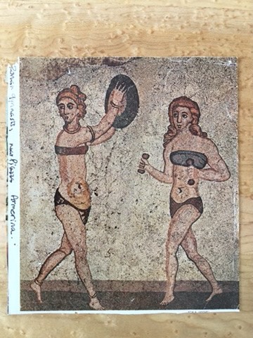 two ancient dancers/female athletes on a postcard. 
